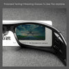 A pair of polarized testing glasses showing an airplane silhouette against a blue sky and green landscape.