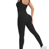 A woman wearing a black ribbed nylon bodycon jumpsuit, shown from the back and side.