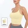 A model wearing a yellow summer strappy yoga sports bra top.