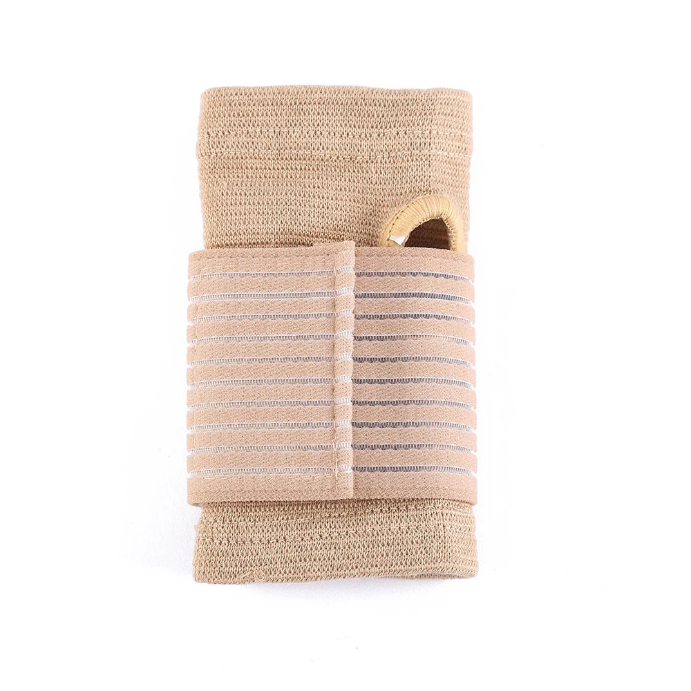 Beige elastic wrist support brace with striped detailing for wrist stabilization.