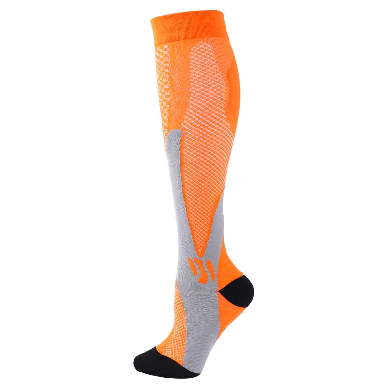 Orange compression socks with gray and black accents for veins and pregnancy