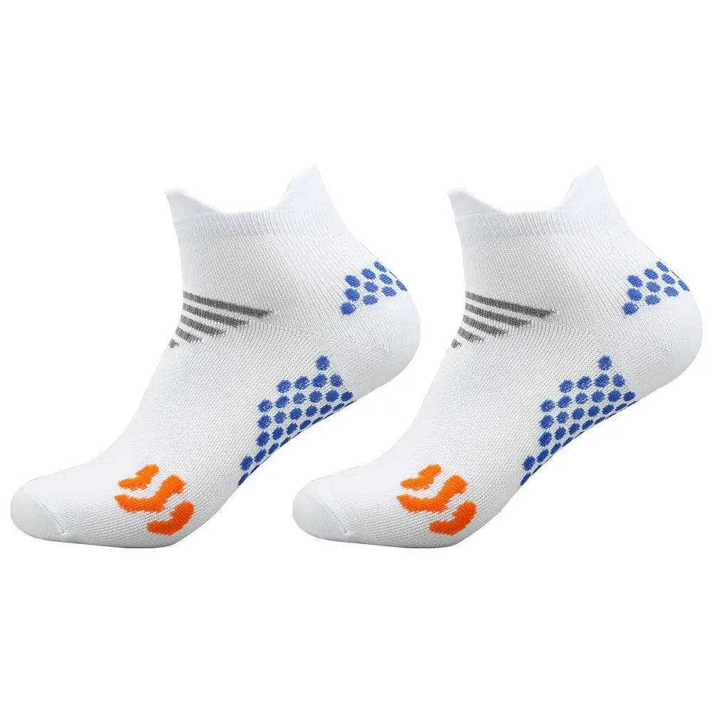 A pair of white cycling and running socks with gray and blue patterned designs
