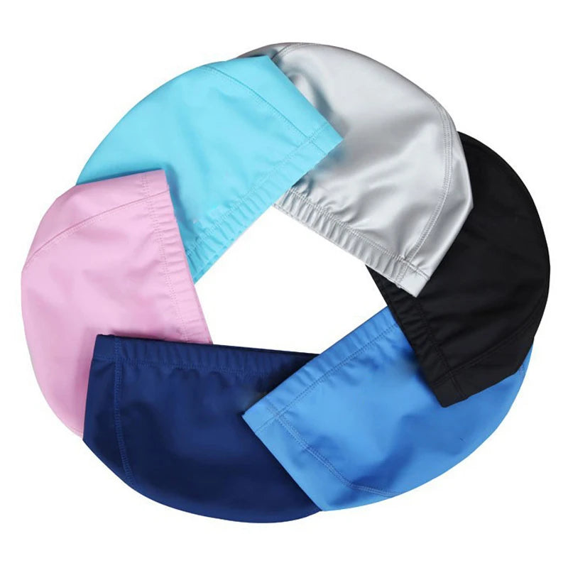 A circular arrangement of six waterproof swim caps in various colors including blue, pink, gray, black, and royal blue.