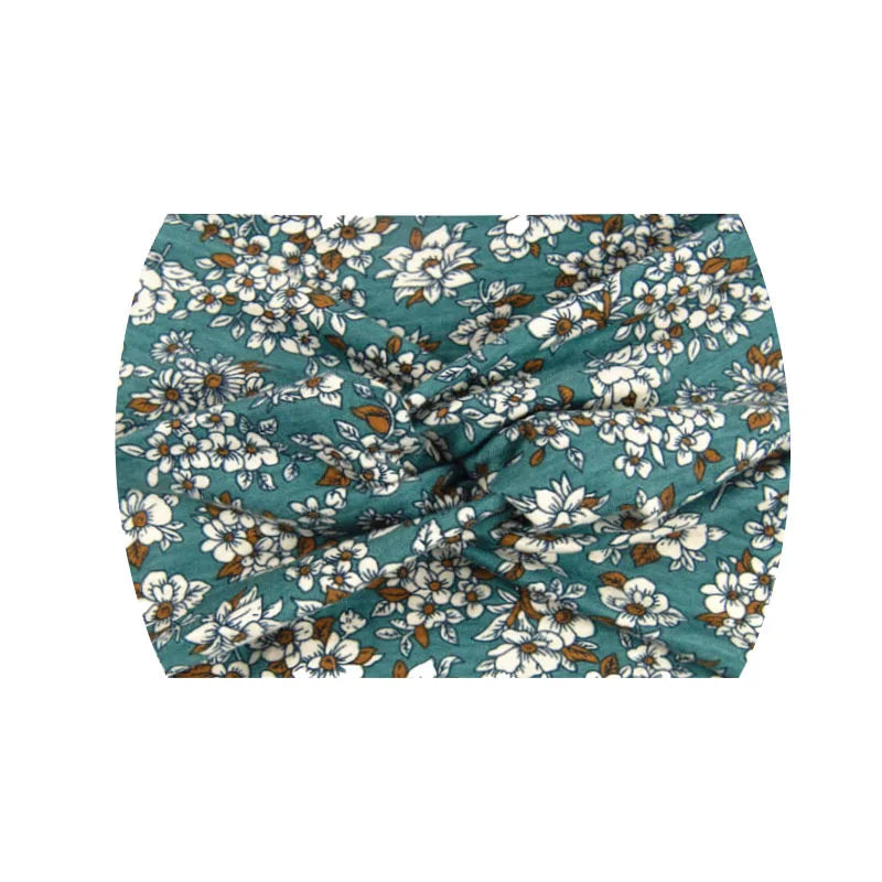 Bandeau de sport à motif floral rayé bleu sarcelle et blanc.