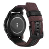 A black Samsung Gear S3 Frontier watch with a dark brown nylon quick release band.