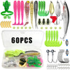 A collection of fishing lures including plugs, spoons, jigs, and various hooks packaged in a clear plastic box.