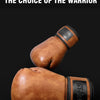 A close-up of a brown leather boxing glove with black stitching and a branded patch on the wrist.