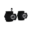 A pair of black heavy-duty weightlifting wrist straps with Chinese characters on the grip.