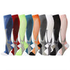A row of colorful compression socks for veins and pregnancy displayed side by side.