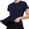 A woman wearing a navy blue quick dry moisture-wicking gym t-shirt and black pants.