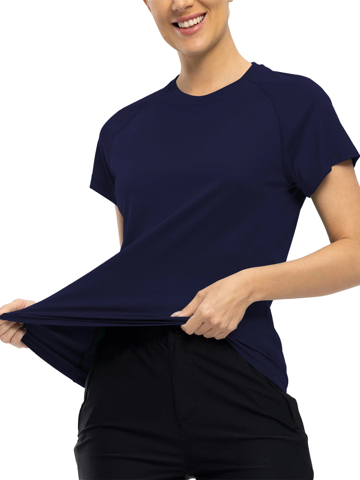 A woman wearing a navy blue quick dry moisture-wicking gym t-shirt and black pants.