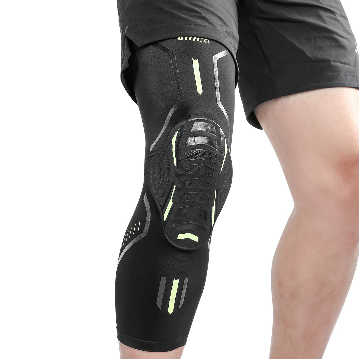 Black performance knee compression sleeve worn on a leg.