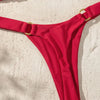 A bright red tie-side low rise bikini bottom is shown against a light background.