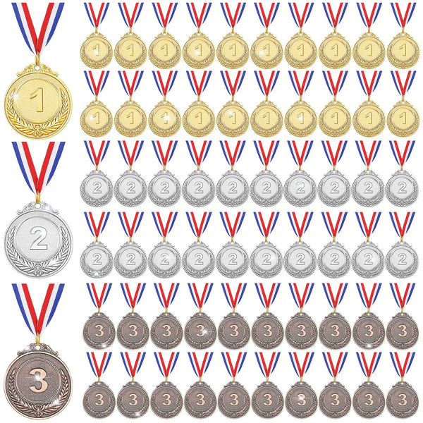 A collection of gold, silver, and bronze award medals with red, white, and blue ribbons arranged in rows.