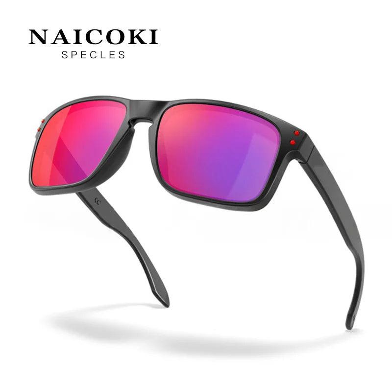 A pair of black sunglasses with vibrant pink and purple polarized lenses shown against a white background.