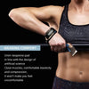 A person wearing black gym weightlifting straps on their wrist during a workout.