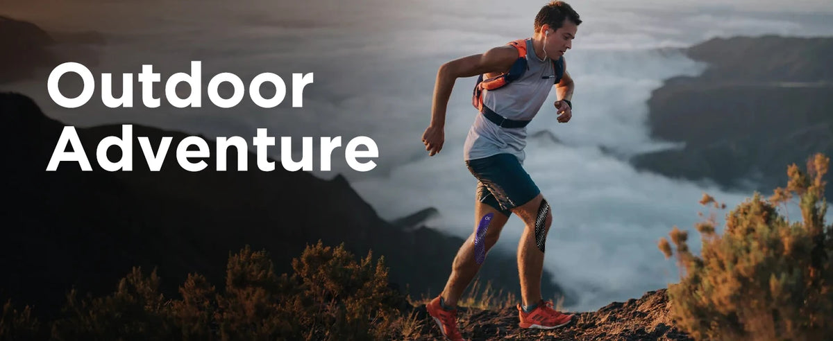 A man running outdoors in a scenic, misty landscape.