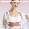 A woman wearing a white top and pink posture corrector back brace for spine and shoulder support.
