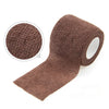 A roll of brown self-adhesive elastic bandage tape with a circular view of the material texture.