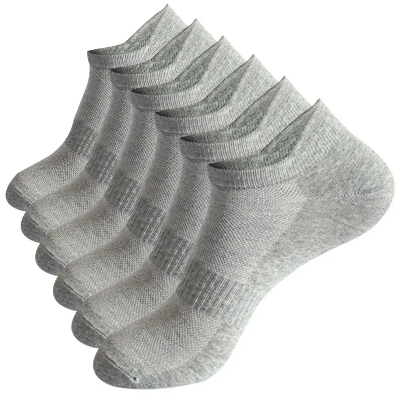 Mehrfachpack graue Knöchelsocken gefaltet und in Fächerform präsentiert