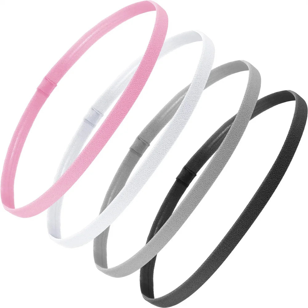 Ein Set von vier Unisex-Elastik-Sport-Headbands in Rosa, Weiß und Grau.