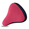 A pink and black breathable 3D mesh bicycle saddle cushion.
