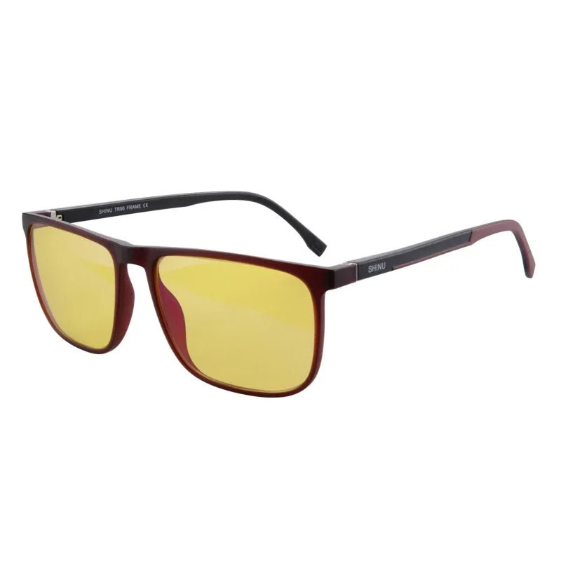 A pair of brown-framed blue light blocking glasses with yellow lenses.