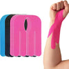 A hand is shown gripping a bright pink kinesiology tape, with a stack of colored tapes visible nearby.