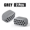 Two grey silicone jawline exercisers for facial toning.