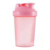 A pink portable protein shaker bottle with a sealed cap and clear body.