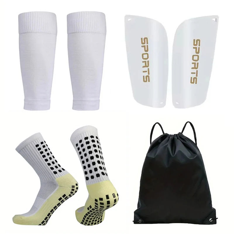 A set of four white sports socks and a black sports bag for football and basketball