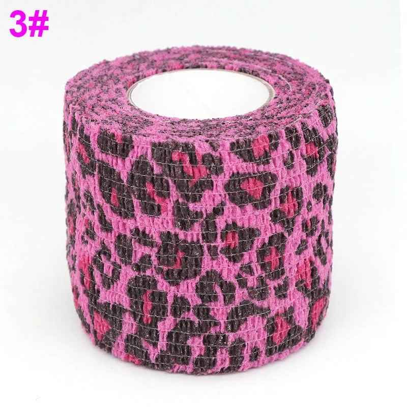 Roll of pink and black leopard print elastic bandage tape for joints