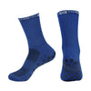 A pair of royal blue performance sports gripping socks shown from the side.