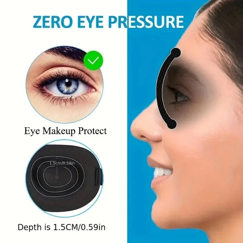 A close-up of a black memory foam eye mask designed to reduce eye pressure and protect the eyes during sleep or travel.
