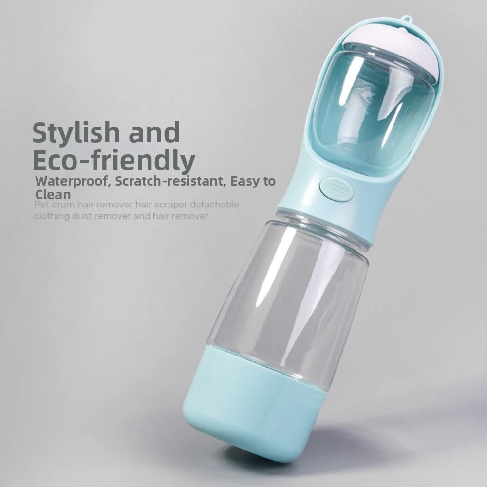 A light blue portable pet water and food dispenser with a clear container and a silicone lid.