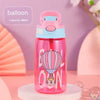 A pink cartoon balloon-themed straw sippy water bottle with a light blue cap, displayed on a white stand.