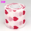 Roll of pink elastic bandage tape with a red heart pattern for joints