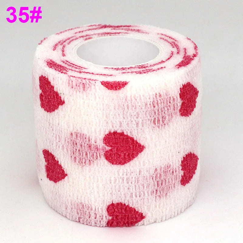 Roll of pink elastic bandage tape with a red heart pattern for joints