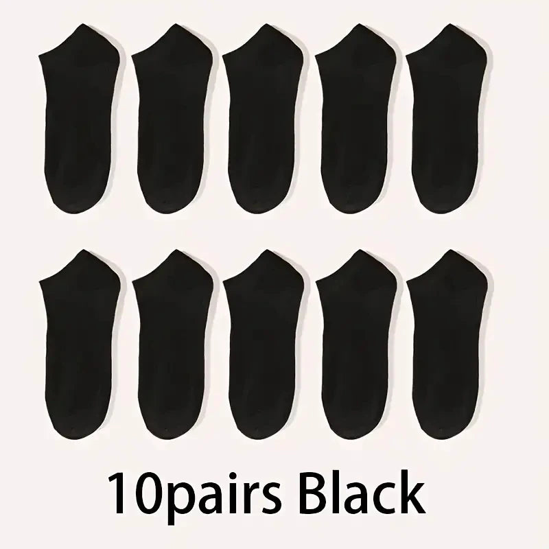 Ten pairs of black comfort fit ankle socks laid out in a row.