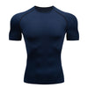 Navy blue men's performance compression t-shirt with dark gray shoulder and sleeve accents.
