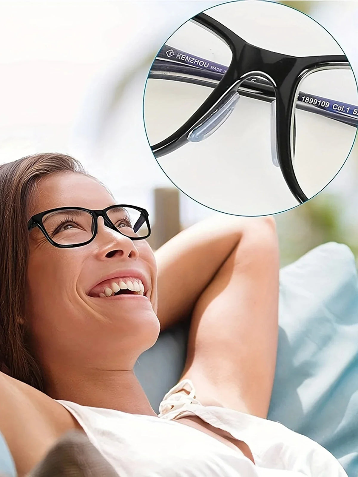 Close-up of black eyeglasses with silicone anti-slip nose pads shown on a woman's face.