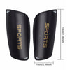 A pair of black non-slip silicone sports socks for football and basketball shown from the side.