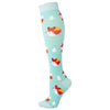 A pair of light blue compression socks featuring repeating patterns of red and white fox faces.