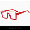 A pair of oversized square semi-rim metal eyeglasses in bright red frame.