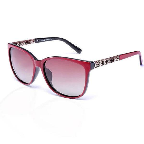Red-framed cat eye polarized sunglasses with a patterned detail on the temples