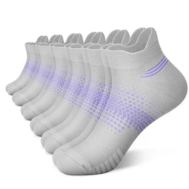 A stack of light gray breathable mesh ankle socks for running and fitness