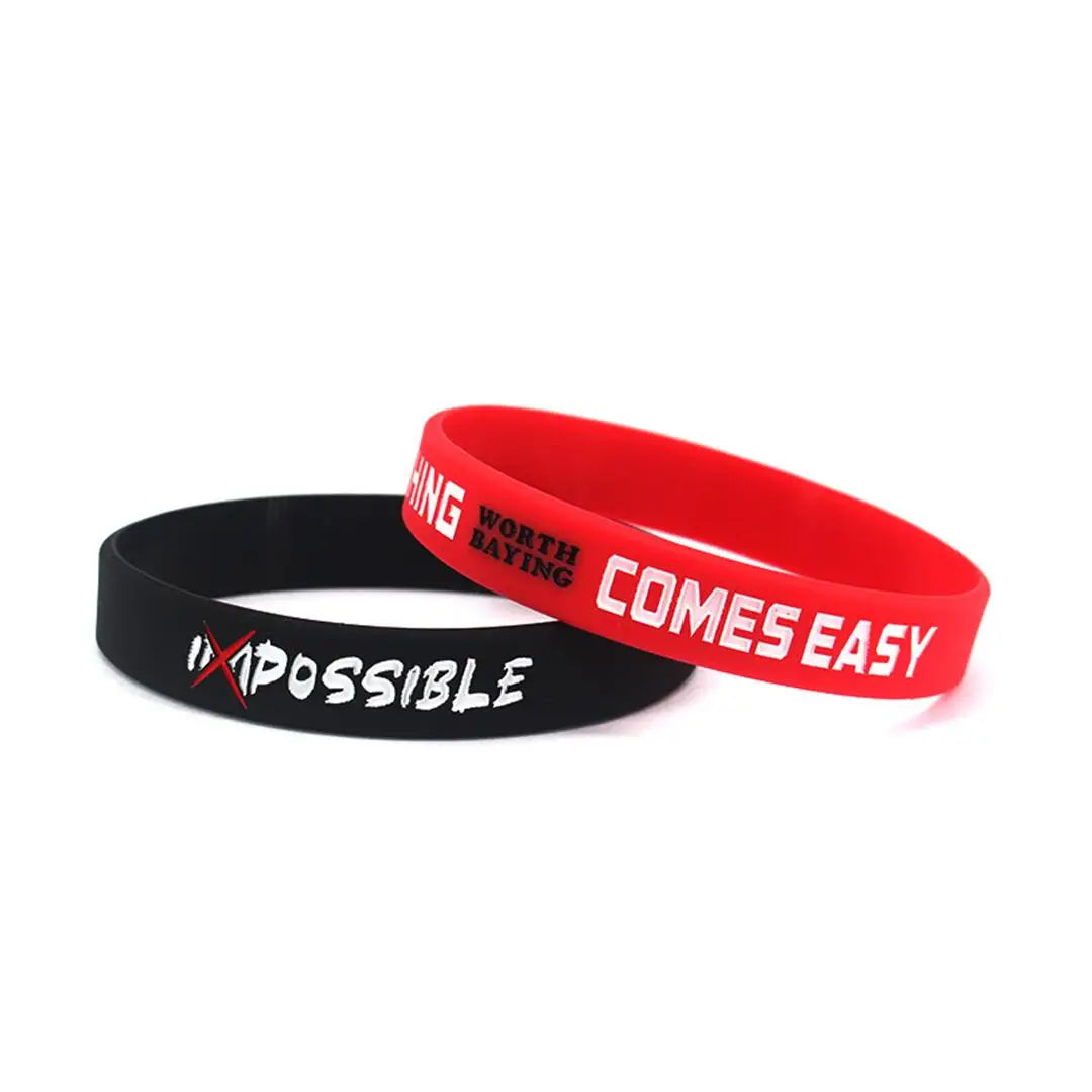 Pulsera de silicona roja con texto blanco que dice 'Las cosas que decir son fáciles'