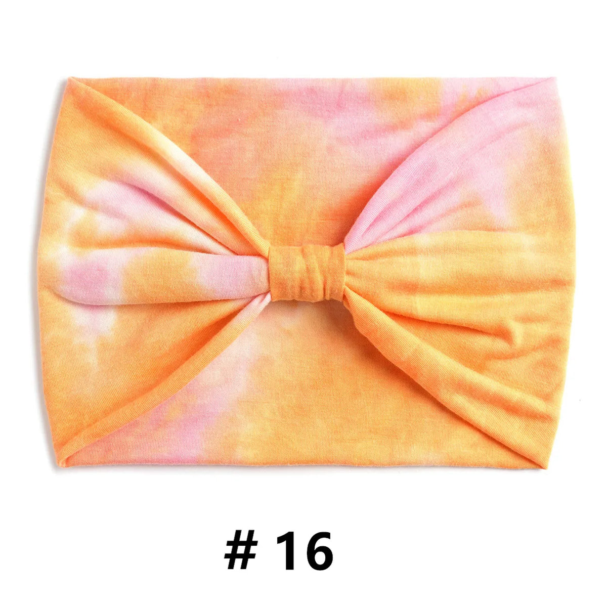 Bandeau en coton tie-dye pêche et rose noué en nœud.
