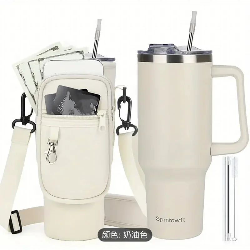 Termo de viaje de acero inoxidable beige con tapa de sorbete transparente y una funda de cuero a juego.
