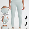 Light blue high-waist yoga leggings shown on a model with diagrams illustrating V-shape design and deep lift features